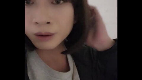 Shemale Ting Xuan outdoors peeing and takes off her underwear for masturbates in the park.